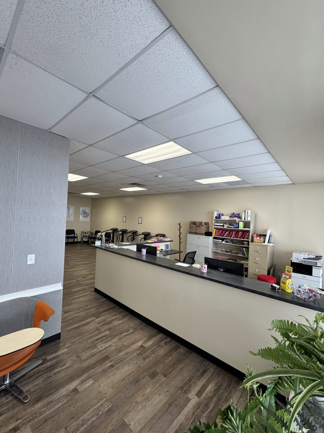 Reception desk and waiting area inside Missouri Injury Clinic