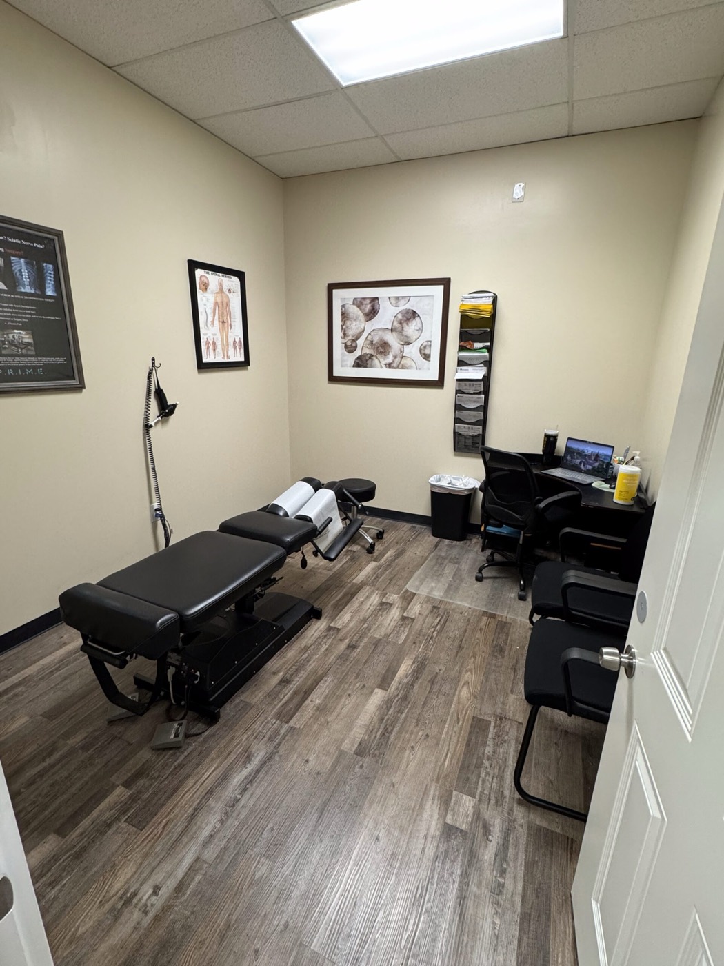 Treatment room with an adjusting table inside Missouri Injury Clinic